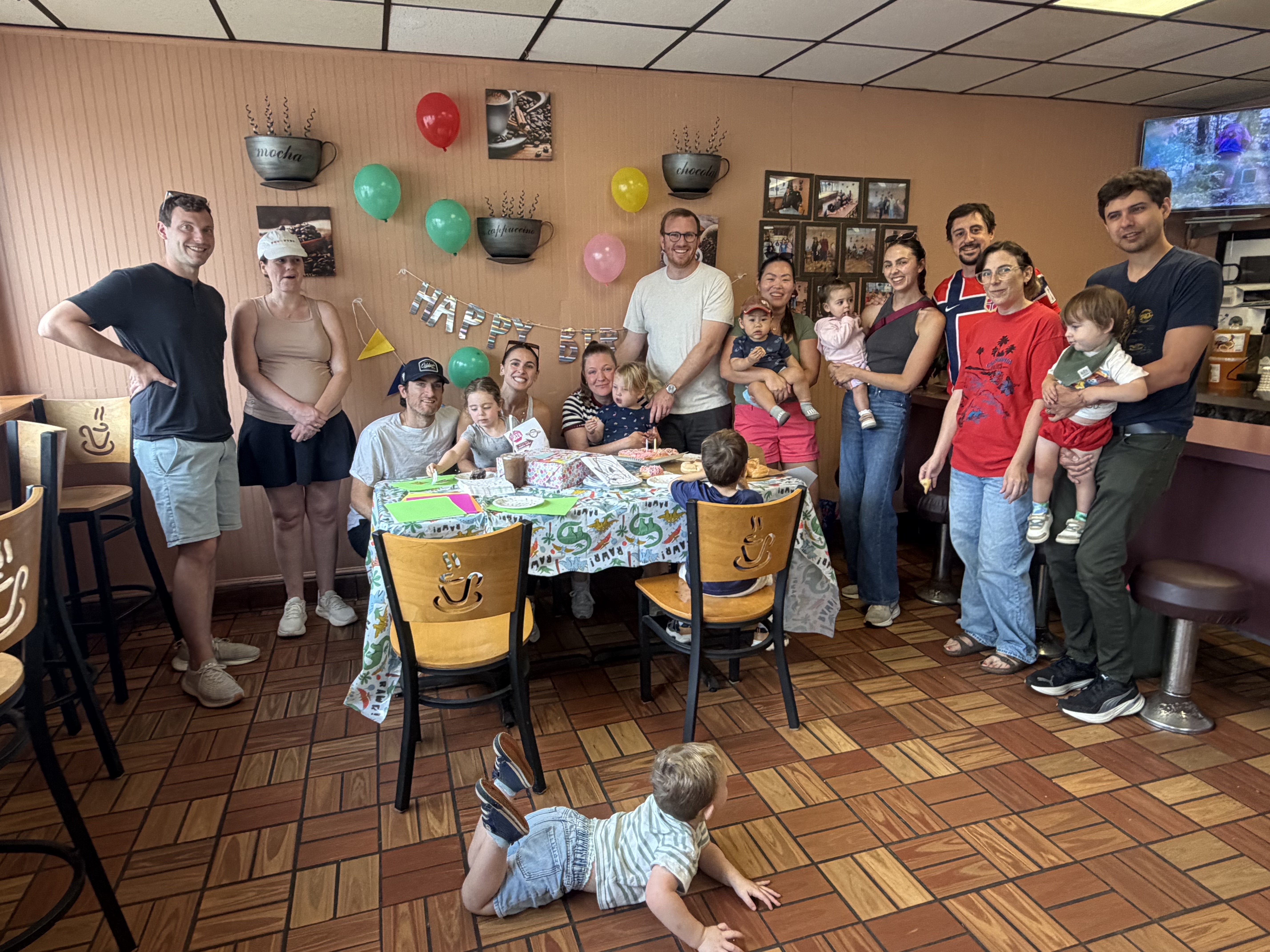 Group photo celebrating a birthday at Anna's