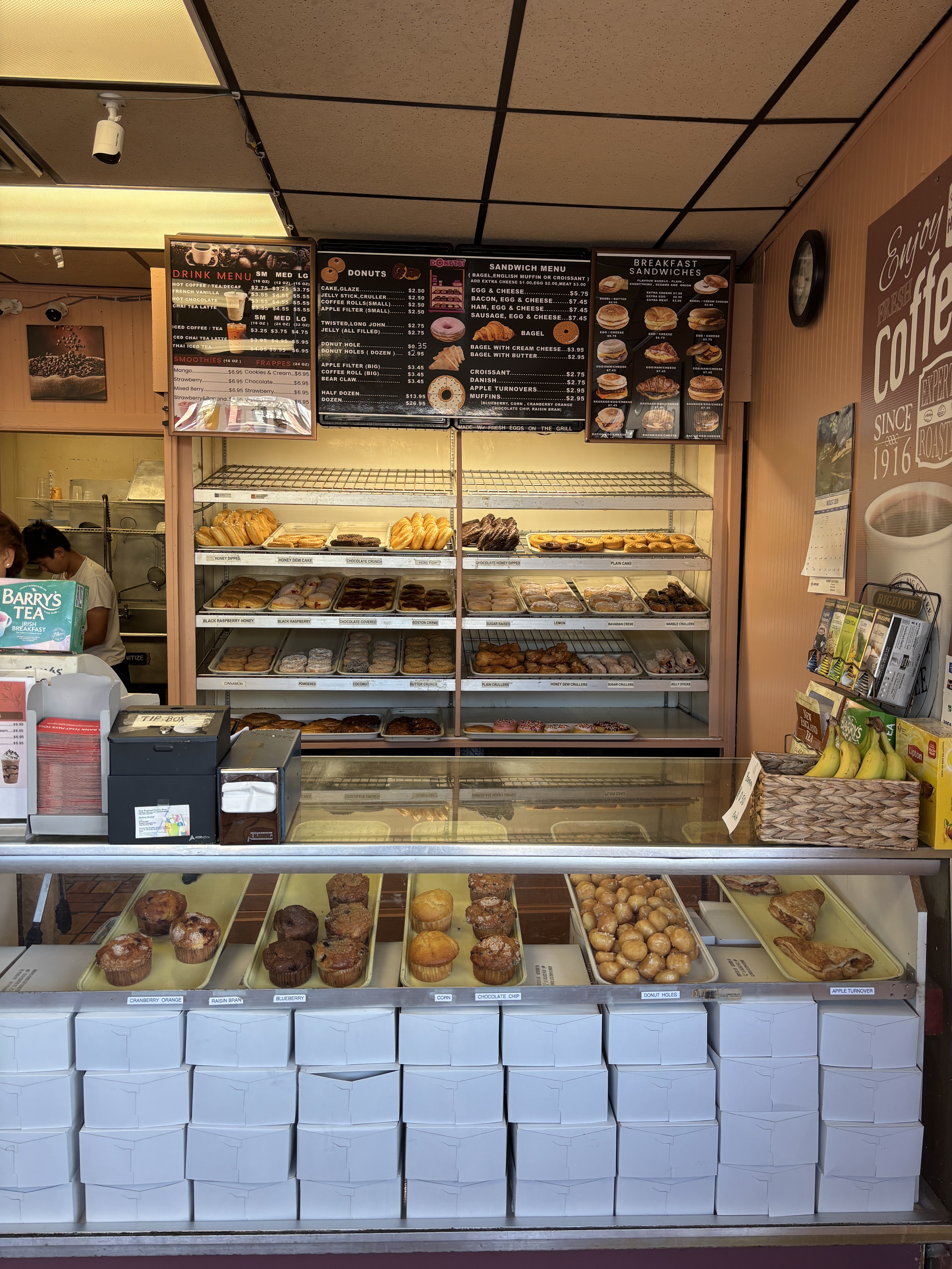 Counter with fresh pastries and menu